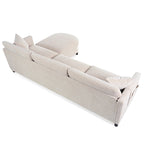 Divano 4 posti in tessuto beige con pouf mobile