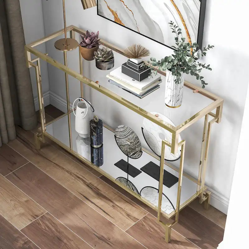 Consolle Glam color champagne con piano in vetro e ripiano a specchio, 1 ripiano